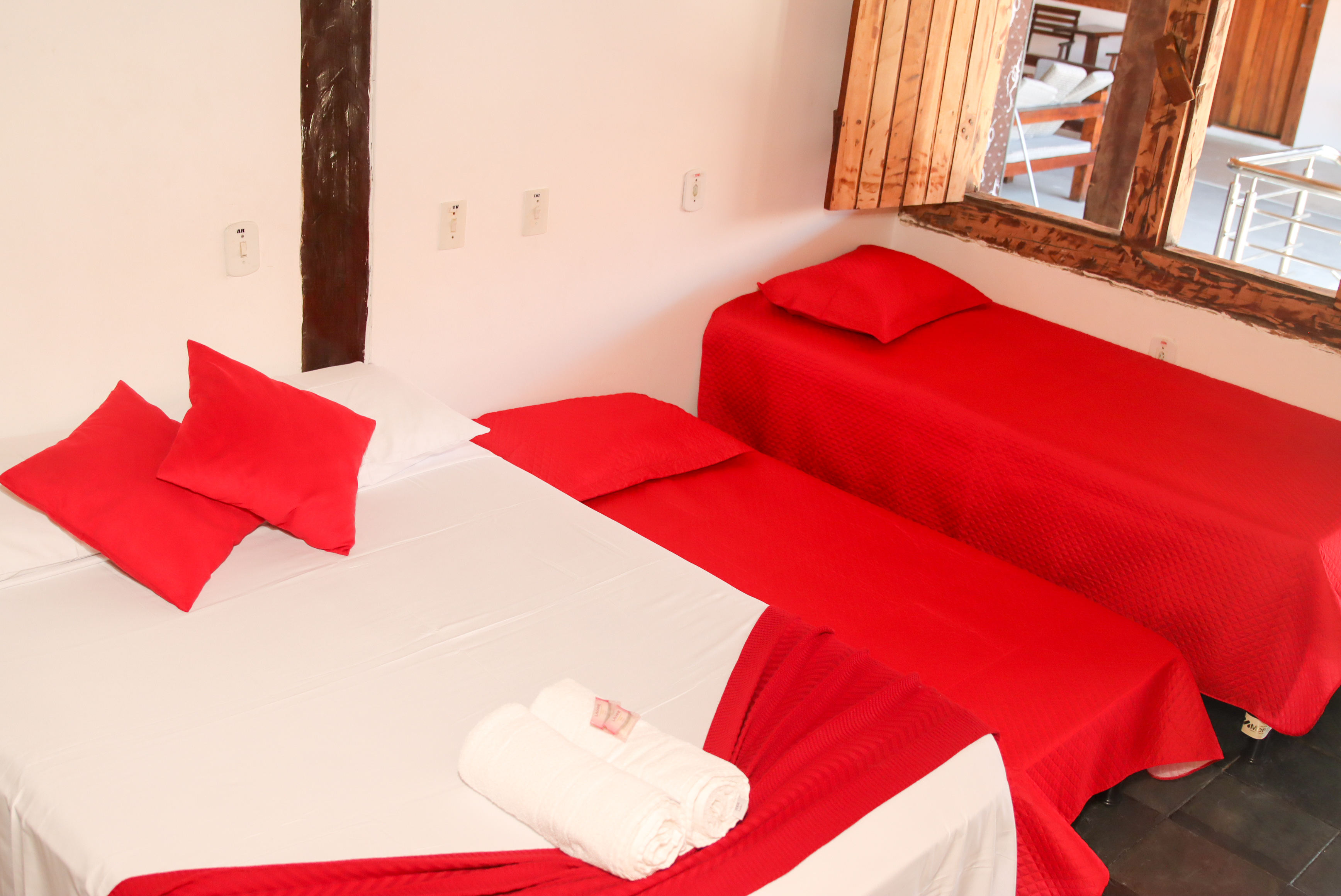 Quarto standard quádruplo da Pousada Luz do Sol